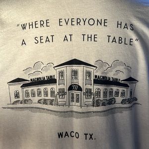 “Where Everyone Has A Seat At The Table” XL Woman’s Magnolia Short Sleeve Tee
